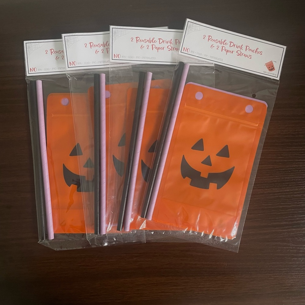 Bundle of 8 Halloween cocktail party drink pouches and paper straws pumpkin